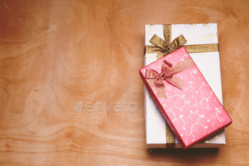 Top view of gift boxes on the wooden table. Free space for text / Photodune, Misc