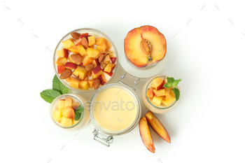 Concept of healthy food with peach yogurt isolated on white background / Photodune, Misc
