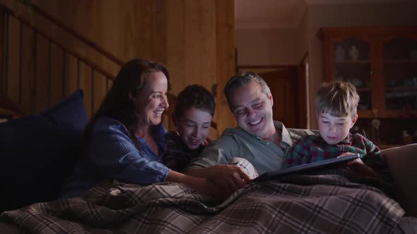 Family spending time together at home in the evening