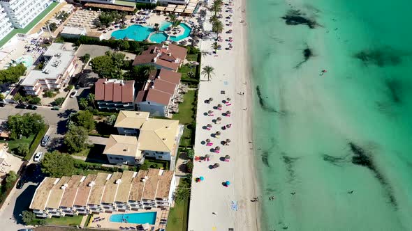 Aerial drone footage of the beach front on the Spanish island Majorca Mallorca, Spain