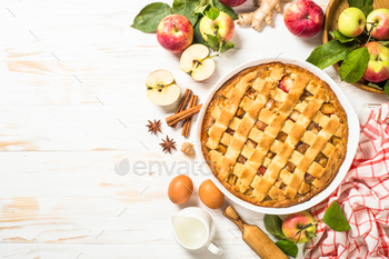 Apple pie with ginger and cinnamon at white wooden table / Photodune, Misc