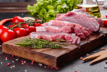 Raw fresh marbled meat Steak on a dark background / Photodune, Misc