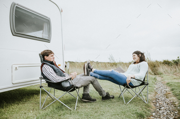 Happy couple sitting after a long day / Photodune, Misc