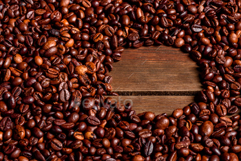 Grains of fresh roasted coffee close-up against a dark background / Photodune, Misc