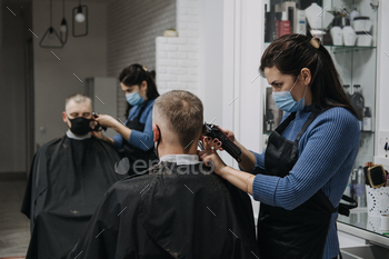 Barber shops, hair salons shutting down, second lockdown. Hairdresser in face mask peeling and / Photodune, Misc