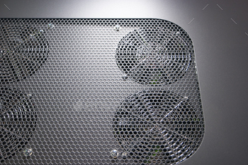 Grey cooling fan system with grid.