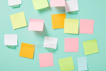 multicolored empty sticky notes with copy space on turquoise wall / Photodune, Misc