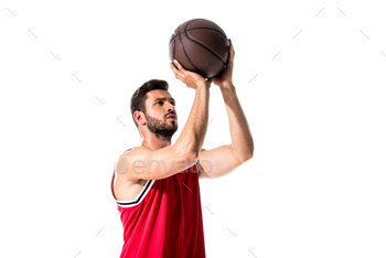 serious athletic basketball player in uniform with ball Isolated On White / Photodune, Misc