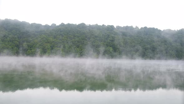 Morning fog over the river. Beautiful landscape.