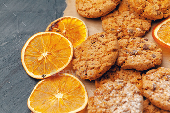 Dried fruit slices with cookies close up on kitchen table / Photodune, Misc