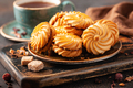 Cookies with cup of tea on a table - PhotoDune Item for Sale