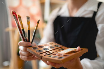 paintbrush art for using by artist, creative craft brush paint with water or oil color on studio / Photodune, Misc