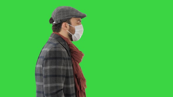 Gentleman Wearing a Protective Face Mask Walking on a Green Screen, Chroma Key