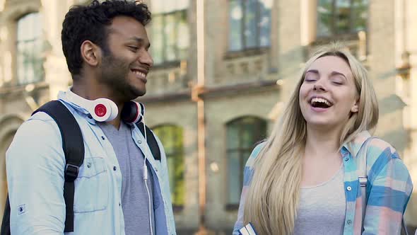 Mixed-Race Guy Joking With Beautiful Blond Girl Best Friends Having Fun