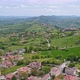 Aerial View Of A Small Town And Green Fields - VideoHive Item for Sale