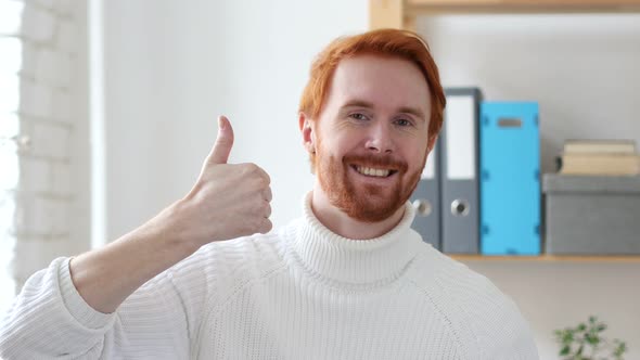 Thumbs Up by Man with Red Hairs