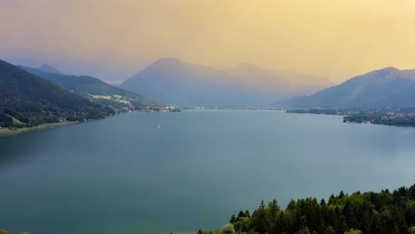 Lake Tegernsee at sunset with a twilight glow over the alps. The last light of a wonderful summerday