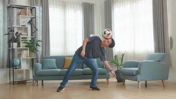 Asian Man Show Skill With Soccer Ball In Living Room, Soccer Freestyle