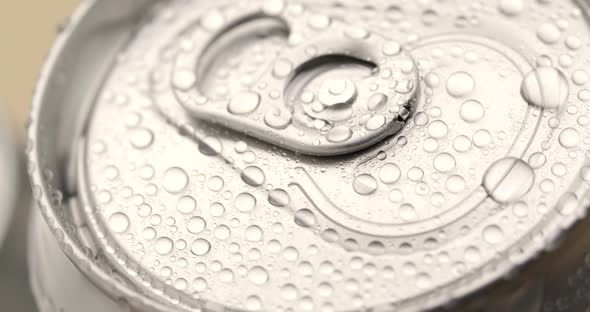 Water droplets on can of soda or beer