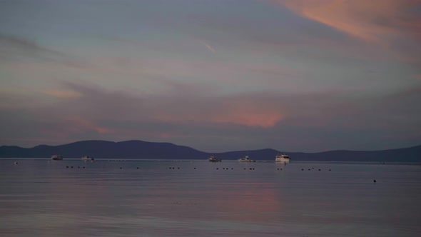 Beautiful View of Lake Tahoe at Dusk with Colorful Reflection of Clouds