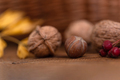Nuts on solid wood table - PhotoDune Item for Sale