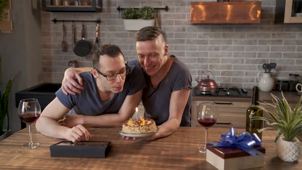 Gay Couple Celebrating Birthday with Cake