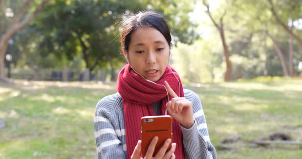 Woman Making Video Live Stream on Cellphone