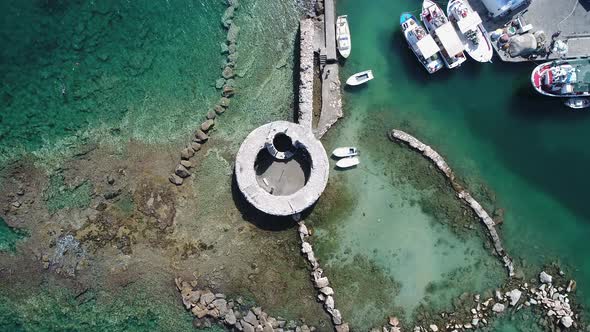 Venetian castle in Naoussa on Paros island in the Cyclades in Greece aerial view