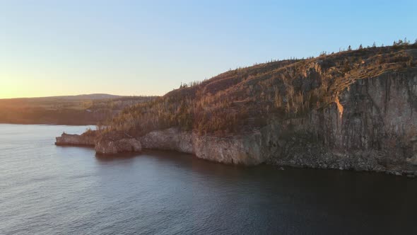 aerial view of palisade head, lake superior shoreline in north shore minnesota during golden hour, w