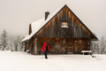 A hiker in front of the wooden hut - PhotoDune Item for Sale