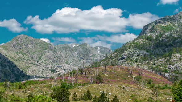 A Time Lapse View of the Accursed Mountains with Clouds in the Grebaje Valley Montenegro