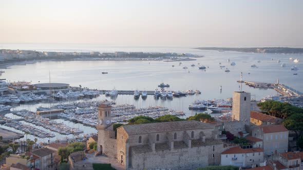 Sunrise view of the Port of Cannes and the Castle Overlooking the Marina