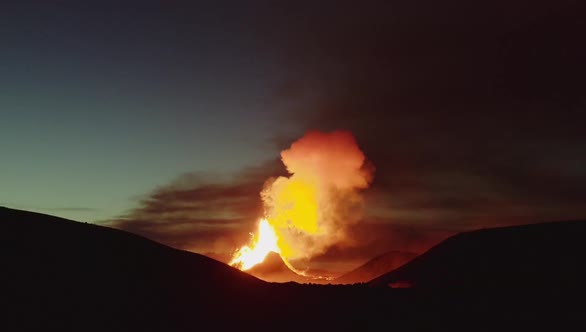 Bursting Magma Creating A Thick Orange Smoke From the Fagradalsfjall Volcano