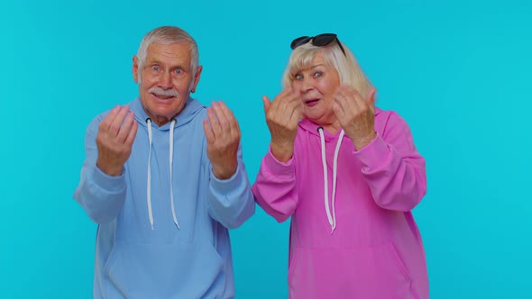 Senior Grandparents Pensioners Showing Inviting Gesture with Hands Ask to Join Beckoning to Coming