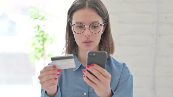 Young Woman making Online Payment on Smartphone