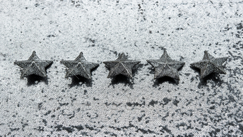 cept. Five silver star on glitter silver background. Five star excellent rating on grey background,