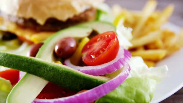 Snacks and salad on plate