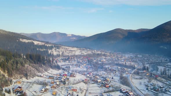 Aerial Drone View Beautiful Winter Mountains and a Valley in Which the Old Settlement Is Located