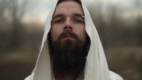 The Face Of Biblical Jesus Christ Of Christianity Looks At The Camera