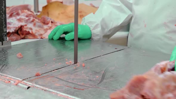 Cutting Meat with a Band Saw in Production