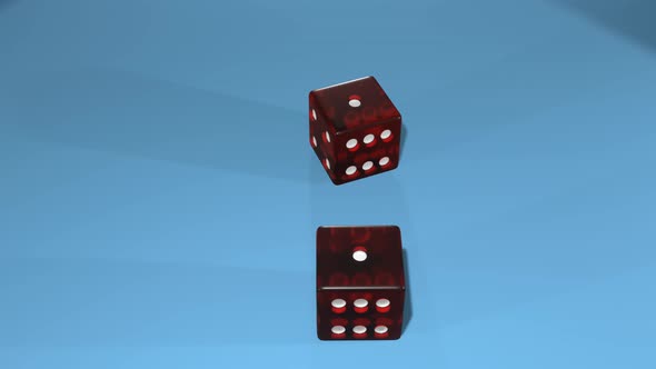 Dice falling on gambling table.