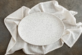 Empty oval plate on tablecloth - PhotoDune Item for Sale
