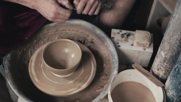 The Hands of a Potter Creating an Earthen Jar on the Circle Closeup Hands on Circle with Clay