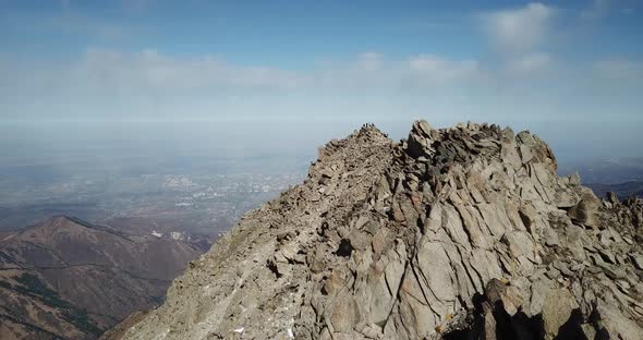 Top View of a Group of Tourists on a Peak