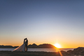 Just married couple against an oceanic landscape - PhotoDune Item for Sale