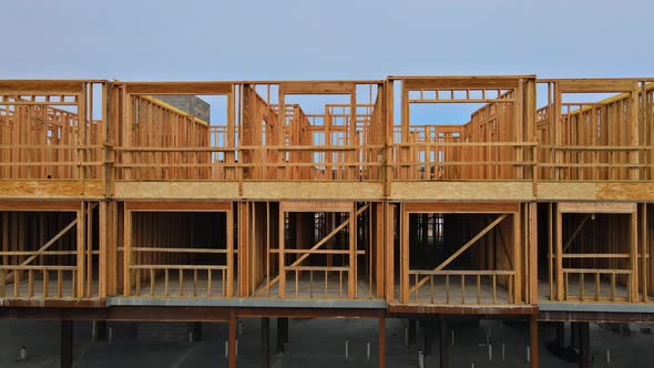 Wood Home Framing at Construction Site with a Wooden Truss Framework