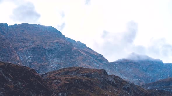 Clouds over mountain 4K timelapse