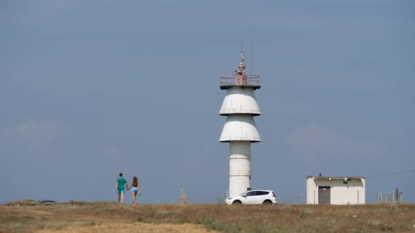 An Active White Marine Lighthouse on the Steppe Coast