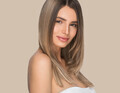 Young woman with beauty skin and beauty hairstyle. Color background. Brown - PhotoDune Item for Sale