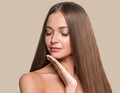Beautiful long smooth hair woman happy clean skin face color background. Brown. - PhotoDune Item for Sale